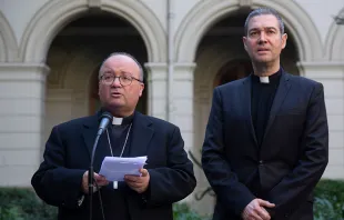 Archbishop Charles Scicluna (L) and Msgr Jordi Bertomeu at a press conference at the Catholic University of Chile on June 13, 2018.   Claudio Reyes/AFP/Getty.