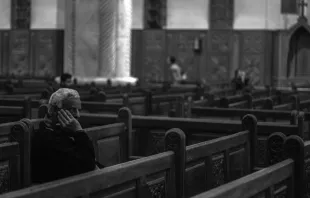 Man in church.   Mosa'ab Elshamy via Flickr (CC BY-NC-SA 2.0).