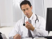 Man writing prescription. 