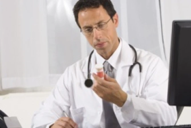 Man writing prescription Credit Jupiterimages Creatas Getty Images CNA US Catholic News 2 21 12