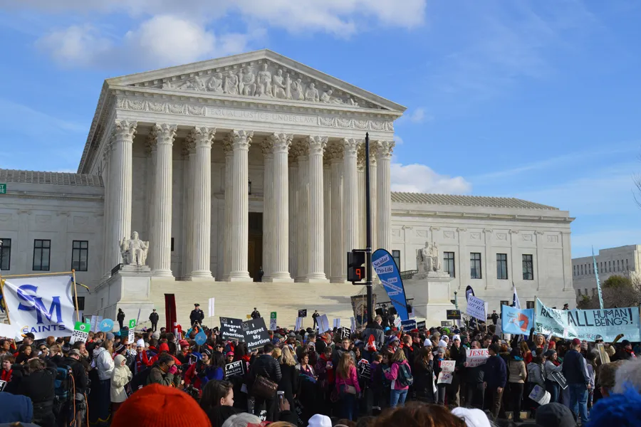 Participants walk past the Supreme Court building during the March for Life in Washington, D.C., Jan. 22, 2015. ?w=200&h=150