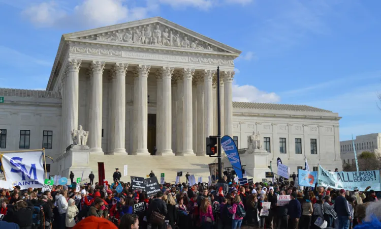 Marchers walk past the Supreme Court of the United States during the 2015 March for Life in Washington DC on Jan 22 2015 Credit Addie Mena CNA CNA 1 22 15