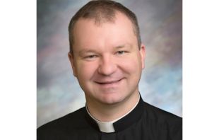 Fr. Marcin Garbacz.   Diocese of Rapid City.
