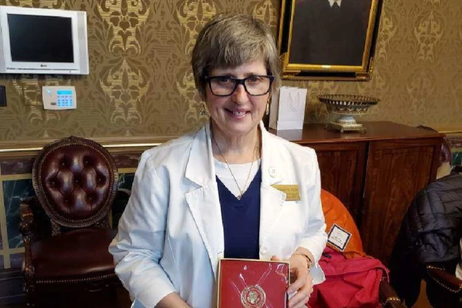 Maria with Presidential Gift