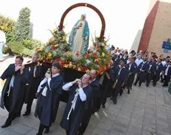 The Marian procession makes its way through Manchester, England. ?w=200&h=150