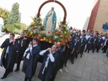 The Marian procession makes its way through Manchester, England. 