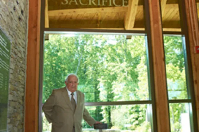 Marine Cpl James Capodanno stands in front of the Sacrifice Window Dedicated to the memory of his brother Father Vincent Capodanno CNA US Catholic News 5 19 11