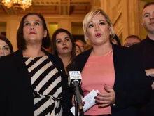 Mary Lou McDonald, Leader of Sinn Fein (L) and Michelle O'Neill, Vice President of Sinn Fein (R) speak after a meeting of the Stormont Assembly, Oct. 21, 2019. 