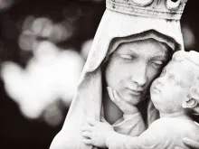 Mary holding Jesus. 