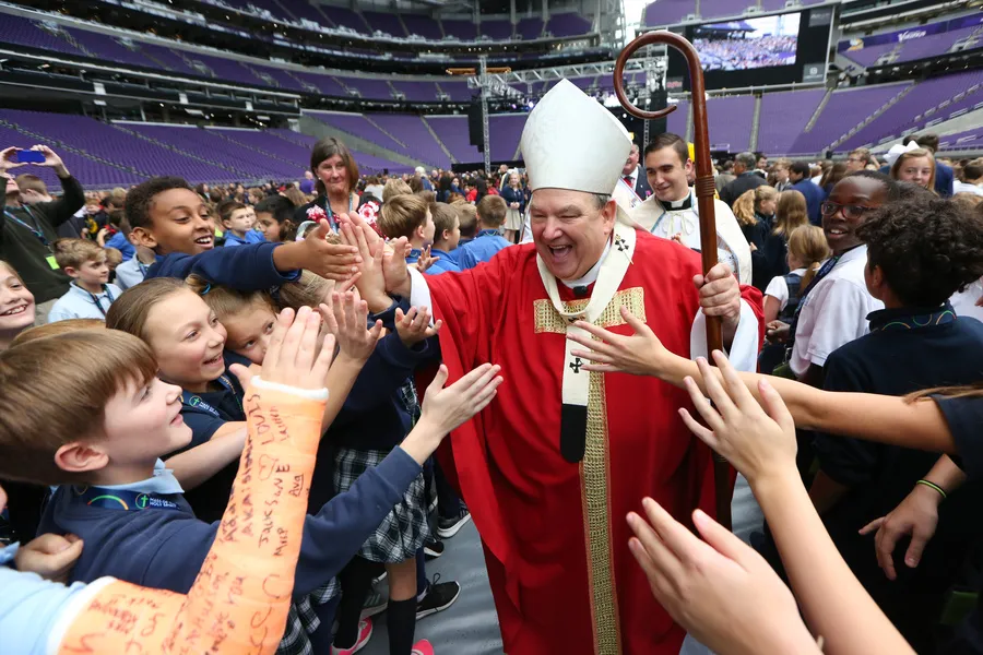 Archbishop Bernard Hebda greets students after the Mass of the Holy Spirit Oct. 10 at U.S. Bank Stadium in Minneapolis. ?w=200&h=150