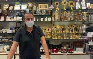Massimiliano Nanni in his reopened shop near the Vatican.   Courtney Mares/CNA.