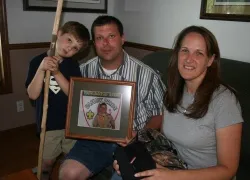 Bryan, Arnell and Jackson Petrzilka display the last photo they took of their son, Ben, before he was killed while away at Boy Scout camp. (Photo ?w=200&h=150