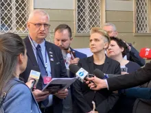 Members of Have No Fear, a Polish organization for sex abuse victims and advocates, speak to media in Rome, Feb. 21, 2019. 