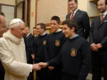 Members of the youth group for the associaton and their leaders greet the Pope in the Vatican. Courtesy of the Association of Sts. Peter and Paul