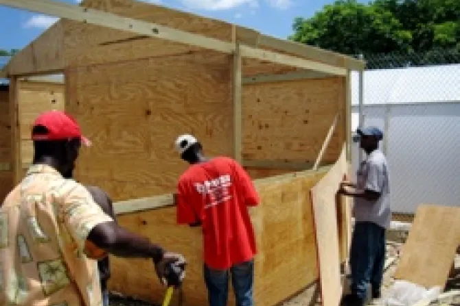 Men build transitional shelter kits in Haiti two years after the earthquake Credit Chris Frey Catholic Relief Services CNA World Catholic News 1 12 12
