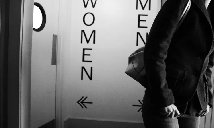 Men women bathroom Credit Tony Gonzalez via Flickr CC BY NC ND 20 black and white added CNA 11 4 15