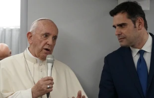 Pope Francis & Vatican spokesman Alessandro Gisotti aboard the papal plane Jan. 28, 2019.    Mercedes De La Torre/CNA