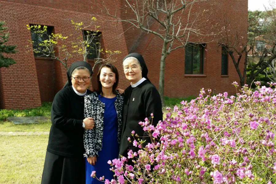 North Korean defector Mi Jin Kang, with the Korean sisters who taught her about the Catholic faith. Courtesy photo.?w=200&h=150