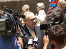 Michael P. Warsaw, Chairman of the Board and CEO of Eternal Word Television Network speaks with the press in this undated file photo. 