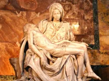 In Michelangelo's Pietà, the Virgin Mary holds her Son as she did at his birth. 