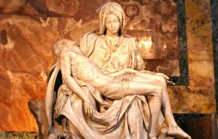 In Michelangelo's Pietà, the Virgin Mary holds her Son as she did at his birth.   Paweesit via Flickr.