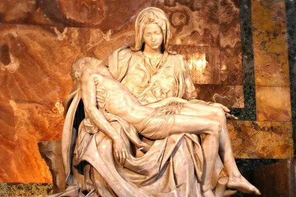 In Michelangelo's Pietà, the Virgin Mary holds her Son as she did at his birth. . Paweesit via Flickr.
