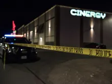 Police cars and tape block off a crime scene outside the Cinergy Odessa movie theater where a gunman was shot and killed on August 31, 2019 in Midland, Texas. 