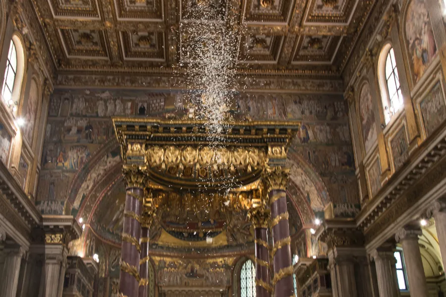 Rose petals fall in St. Mary Major Basilica Aug. 5, 2017 to commemorate the "miracle of the snow." ?w=200&h=150