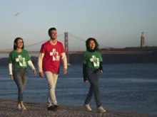 Young people wearing T-shirts with the official WYD Lisbon 2023 logo.