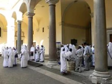 Missionaries of Charity sisters and brothers in the courtyard outside San Lorenzo in Damaso Church in Rome