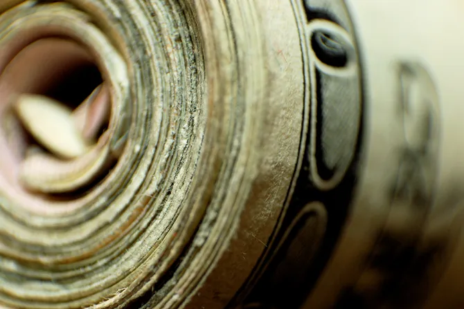 Money roll Credit Zack McCarthy via Flickr CC BY 20 CNA 7 28 15
