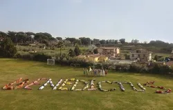 More than 100 students send a message to Pope Benedict as he flew overhead in a helicoptor to Castel Gandolfo. ?w=200&h=150