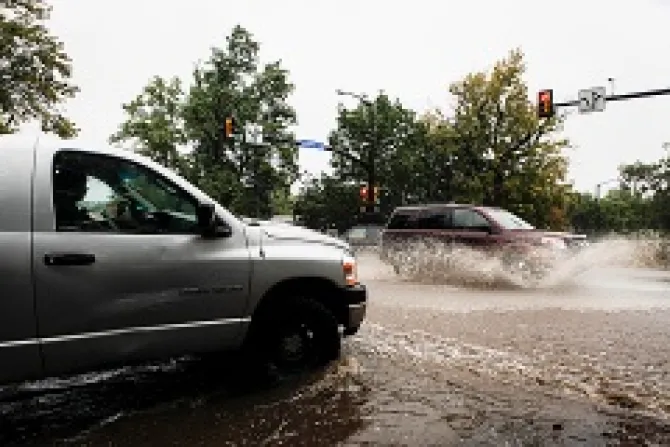Motorists attempt to drive through downtown Boulder after three days of heavy rainfall Sept 12 2013 in Boulder CO Credit Dana Romanoff Getty Images News Getty Images CNA