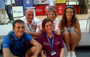 Mrs. Daniela Burgio (Back Center) and husband with three of their five children attend the Rimini Meeting, August 25, 2014.   Andrea Gagliarducci/CNA.