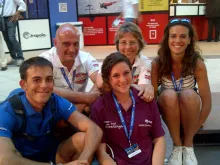Mrs. Daniela Burgio (Back Center) and husband with three of their five children attend the Rimini Meeting, August 25, 2014. 