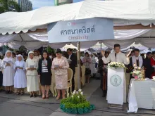 Msgr. Vissanu leads an interreligious prayer service in Bangkok for the victims of the Erawan shrine bombing, Aug. 21, 2015. 