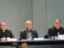 Msgr. Jose Maria Gil Tamayo, Fr. Federico Lombardi, and Fr. Thomas Rosica speak to the press on Feb. 26, 2013. 