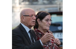 Mubarak and Agnese Hano from Iraq at Mass with Pope Francis.   Bohumil Petrik/CNA.