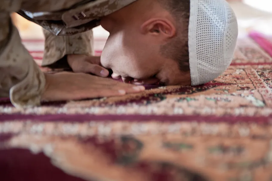 A Muslim chaplain of the US Navy prays during Ramadan at Camp Leatherneck, Helmand, Afghanistan, Aug. 17, 2011. ?w=200&h=150