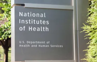 Sign outside National Institute of Health, Department for Health and human Services, Washington DC. Via Shutterstock 
