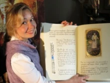 Natalia Tsarkova with her book for Pope Benedict XVI's birthday.