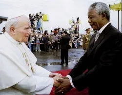 Nelson Mandela greets Pope John Paul II on his arrival at the airport in Johannesburg on September 16, 1995. ?w=200&h=150