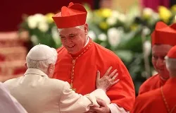New German Cardinal, Gerhard Ludwig Muller is met by Benedict XVI in St Peter's Basilica Feb. 22, 2014. ?w=200&h=150
