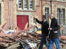 Officials survey damage after the Feb. 22 earthquake in Christchurch