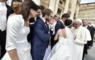 Newly married couples meet Pope Francis in St. Peter's Square on Sept. 9, 2015.   L'Osservatore Romano.