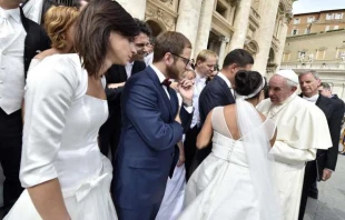 Newly married couples meet Pope Francis in St. Peter's Square on Sept. 9, 2015.   L'Osservatore Romano.
