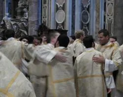 The newly ordained deacons congratulate each other after the Oct. 6, 2011 ordinations at St. Peter's Basilica?w=200&h=150