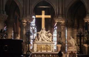 The Descent from the Cross, also known as Pieta, statue inside the Cathedral Notre-Dame de Paris before the fire.   Jeanne Emmel/Shutterstock.