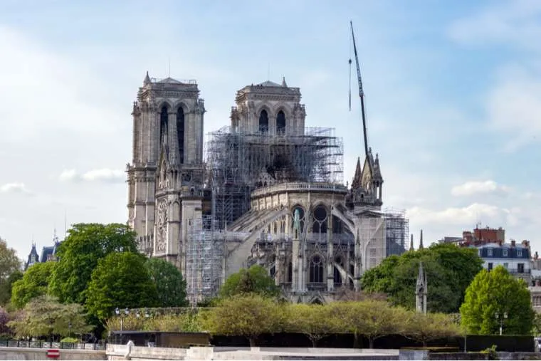 Notre Dame Cathedral in Paris, the day after a massive fire damaged parts of the roof and structure.?w=200&h=150
