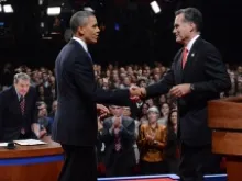 President Obama and Gov. Mitt Romney shake hands after the Presidential Debate at the University of Denver on October 3, 2012. 
